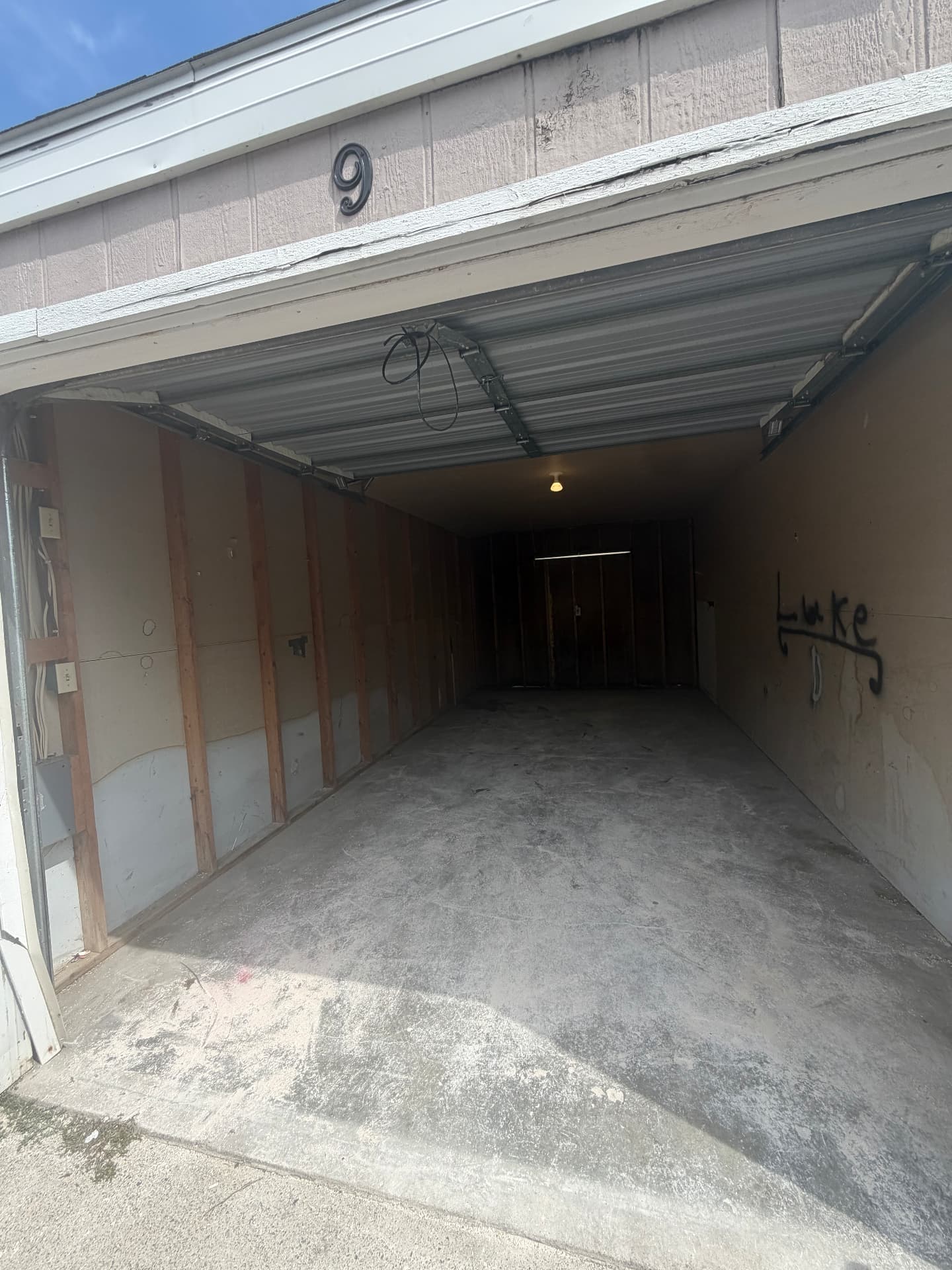 After: the same garage emptied and cleaned by 701 Haulers